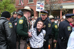 Evan Pierce, one of Keene's bold activists, is kidnapped by armed men at the Pumpkin Fest 4:20. (Photo by Chris Muskus)